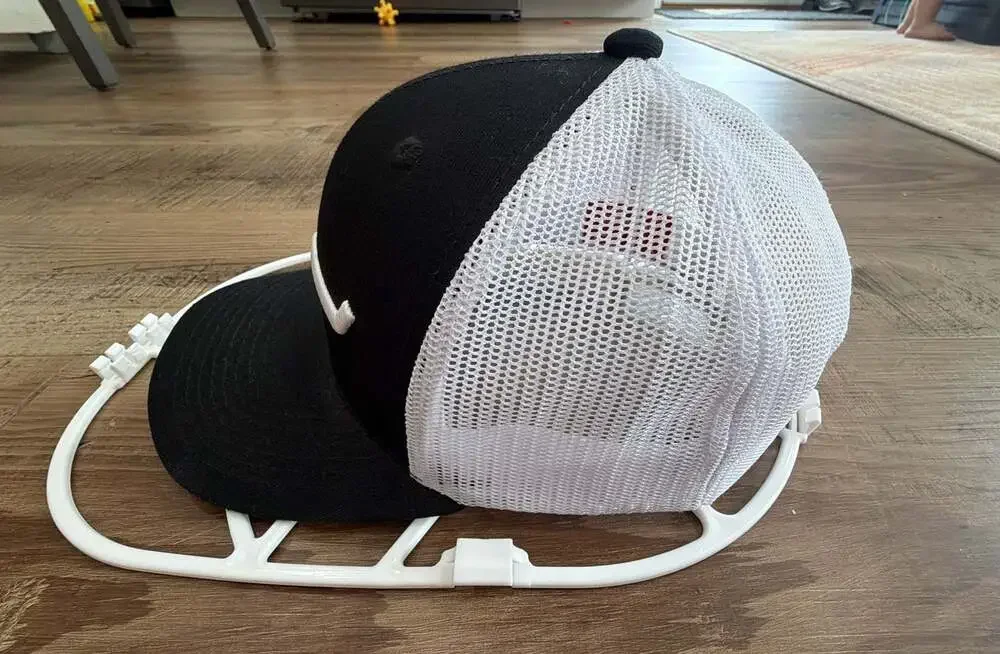 Kimes Ranch Weekly Trucker Cap in Black and White